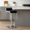 Contemporary Waterfall bar chair with stainless steel frame and black seat in grey kitchen
