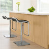 Pair of Waterfall stainless steel bar chairs with black seats at modern kitchen counter