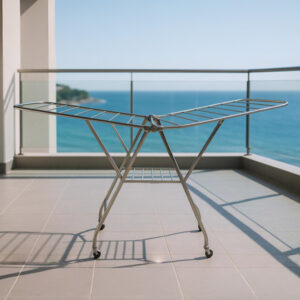 stainless steel laundry foldable laundry rack with castors on balcony overlooking ocean
