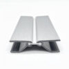 Front view of flexible silver plinth and kickplate corner connector for kitchen cabinet installations