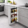 side mounted pull out spice rack with soft close slides in modern kitchen cabinet storing oils and condiments