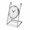 Side angle view of a chrome hanging clock for kitchen rail with hooks and white clock face.