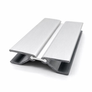 Angled view of flexible silver plinth and kickplate corner connector for kitchen cabinet installations