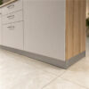 Silver Plinth 150mm installed beneath kitchen cabinets creating a neat and professional finish