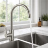 Elegant Capri stainless steel kitchen mixer featuring a high curved spout and precise single lever operation