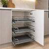 Three Nano Grace pull-out motion baskets installed in a base kitchen cabinet