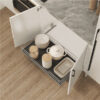 Wide Nano Grace pull-out motion basket with cookware and crockery