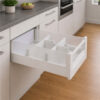 Elite 5 soft-close drawer system with tempered frosted glass panels and dividers